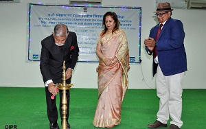 The Governor of Arunachal Pradesh Brig. (Dr.) B.D. Mishra (Retd) and the First Lady of the State Smti. Neelam Mishra  lighting the state level  painting competition on Energy Conservation organised by NHPC to promote energy conservation and prevent energy misuse at State Banquet Hall, Itanagar on 14th November�2017.